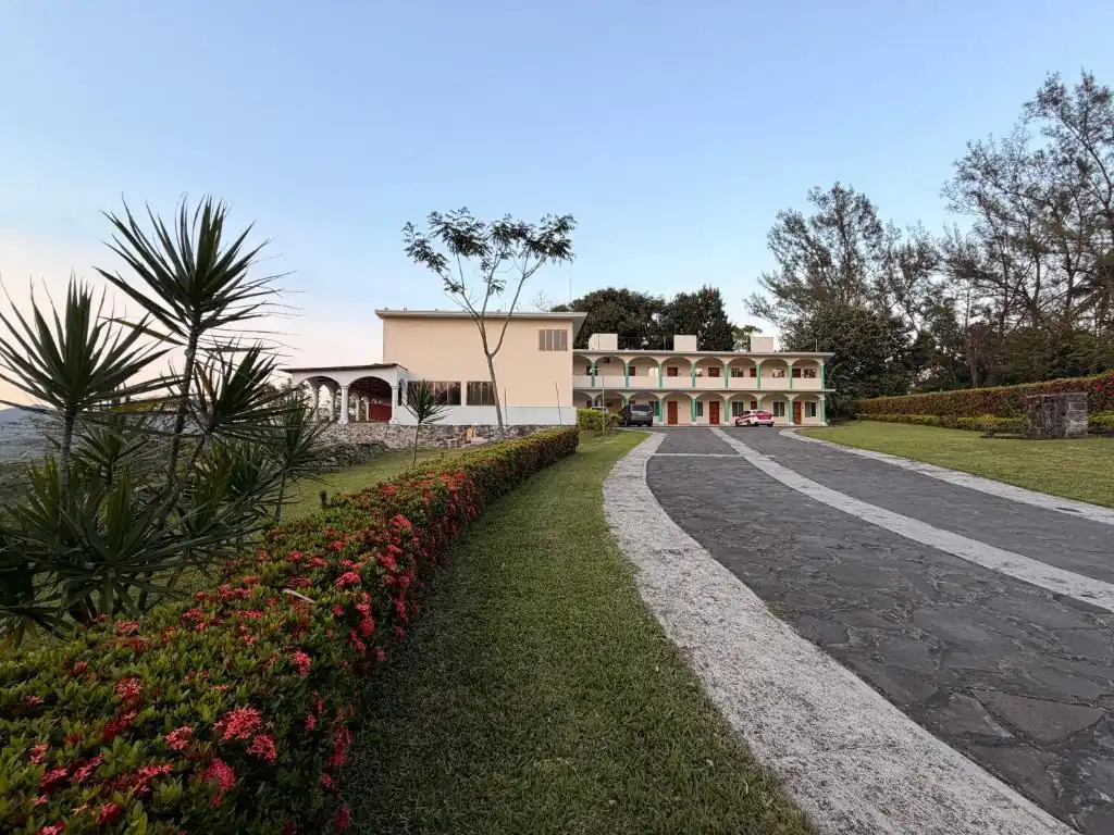 Landscaped gardens and entrance to Hotel Mirador Santiago